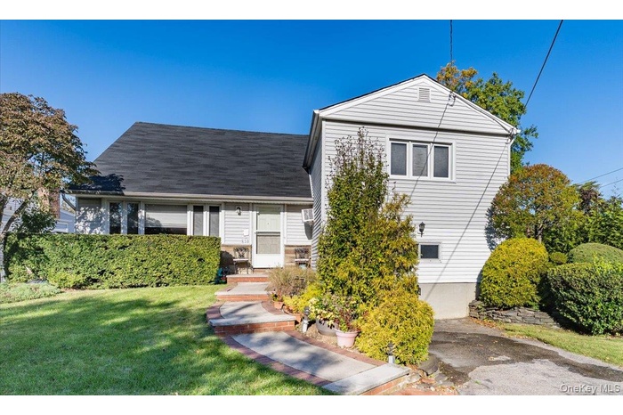 View of front of home with a front lawn