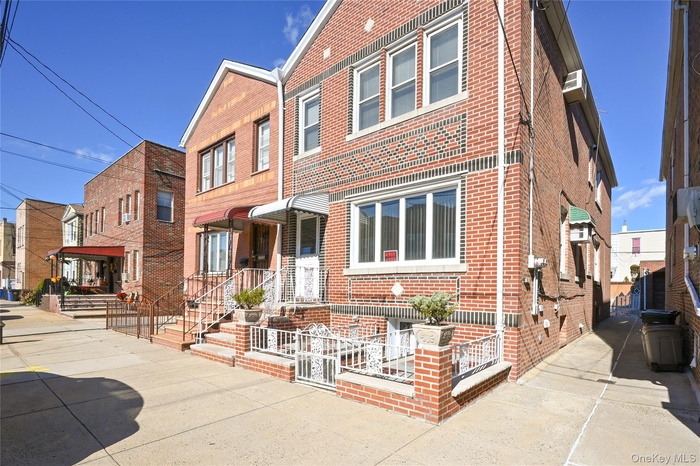 Traditional home with brick siding