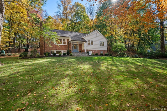 Welcome to 341 Millwood Road in Chappaqua. Thoughtfully renovated and set on a picturesque property framed by mature foliage, this home offers refined