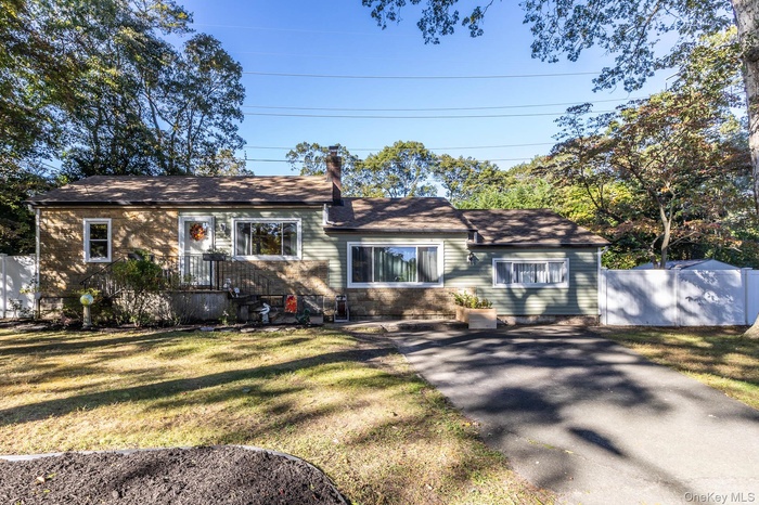 View of front of property featuring a chimney