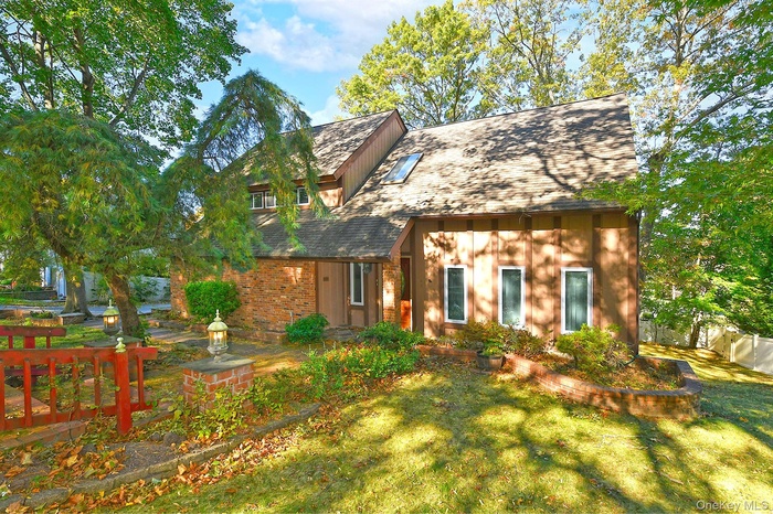 View of front facade with brick siding