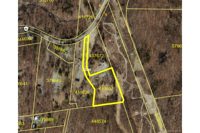 Aerial overview of property's location featuring property parcel outlined