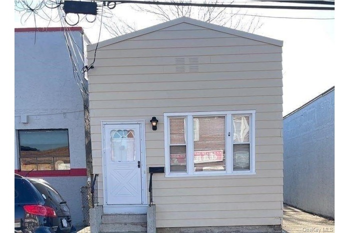 View of front of house with entry steps