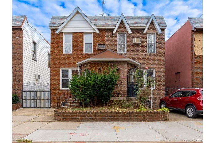 View of front of home with brick siding