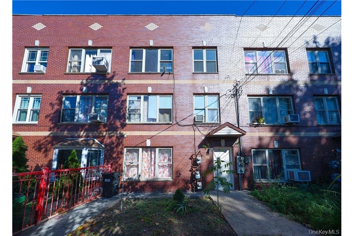 View of front of house with brick siding