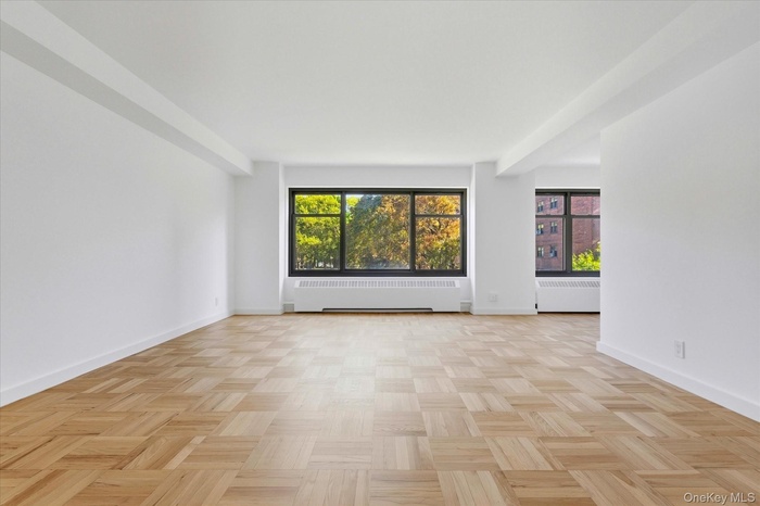 Empty room with radiator heating unit