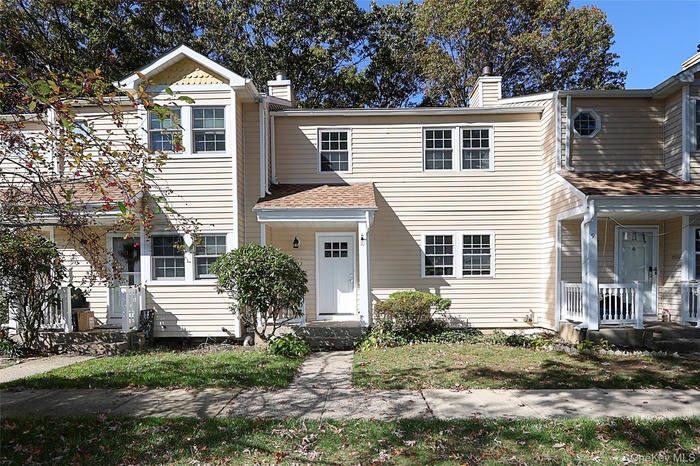 Traditional-style home with a chimney