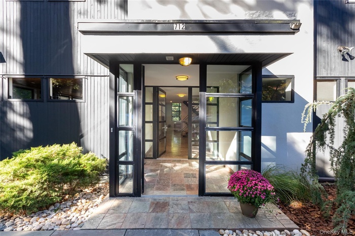 Doorway to property featuring french doors