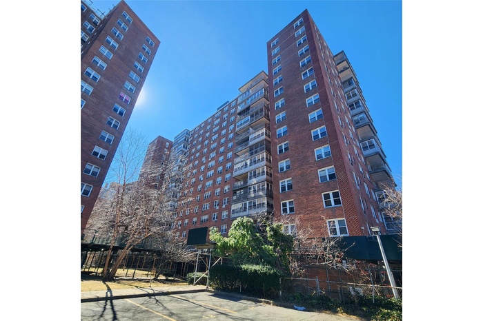 View of property featuring fence