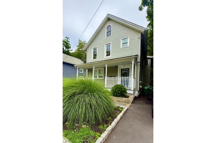 View of front of property with covered porch