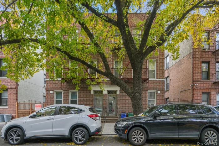 View of front of property featuring brick siding