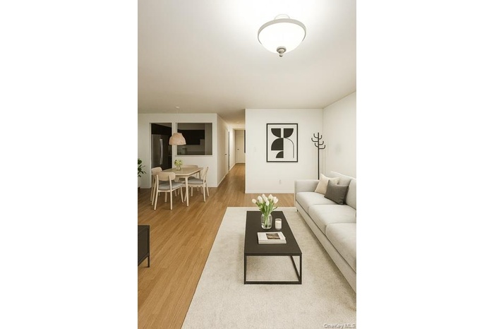 Living area featuring light wood-style flooring