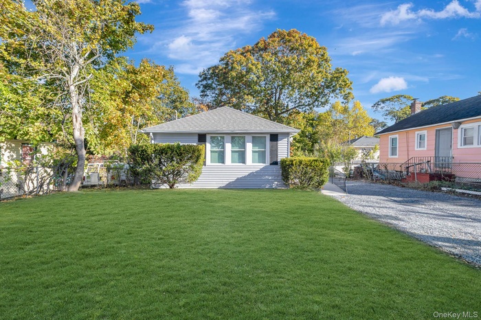 View of front of property featuring roof with shingles