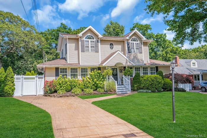 Welcome to 12 Rachel Avenue in Commack!