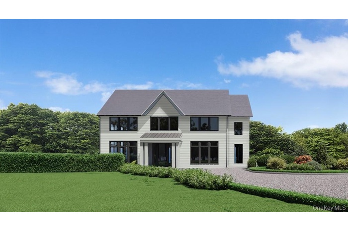 Modern inspired farmhouse featuring a front lawn