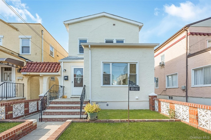 View of front of property with stucco siding