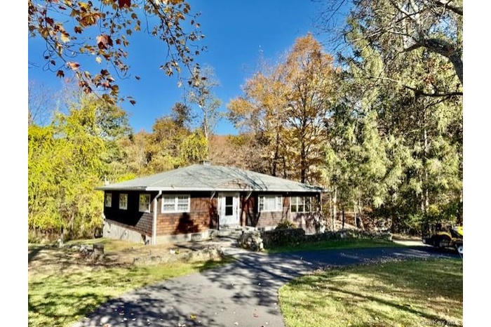 View of front with a circular driveway