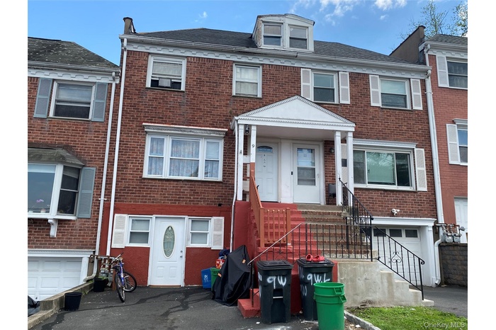Multi unit property featuring brick siding