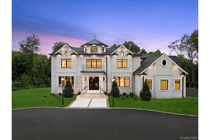 French country style house featuring a front yard and french doors