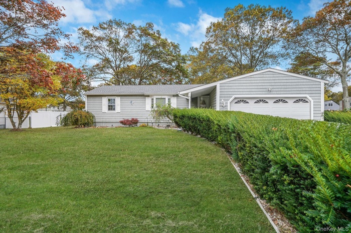 View of front of home with an attached garage