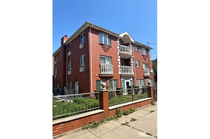 View of property with fence
