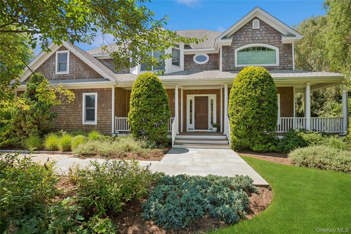 View of front of house featuring covered porch