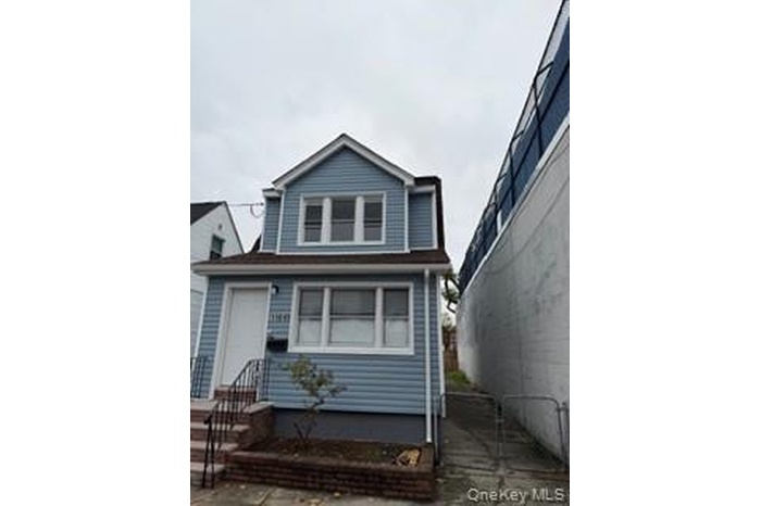 View of front of house with a gate