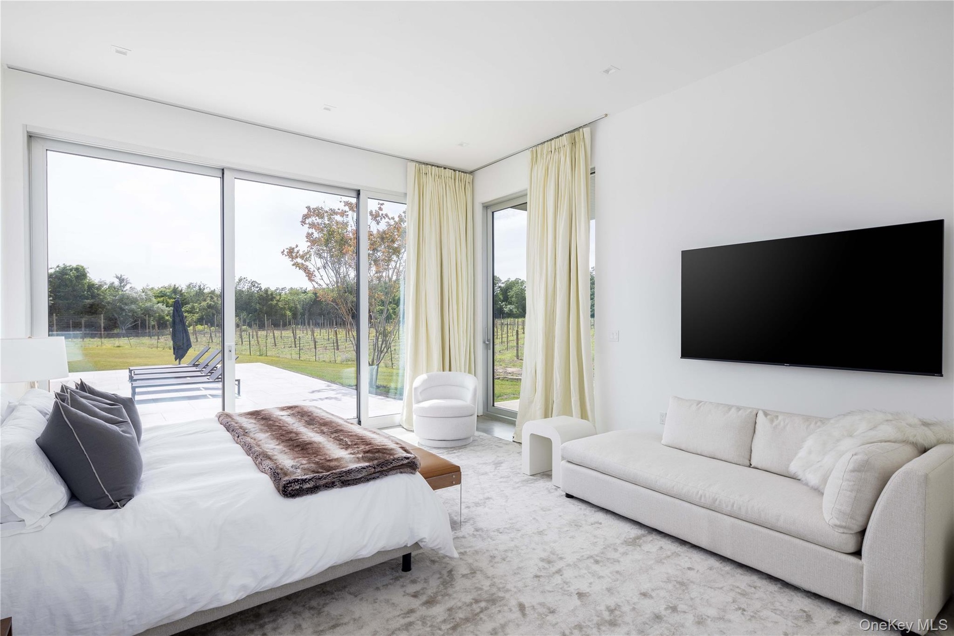 Bedroom featuring access to outside and carpet floors