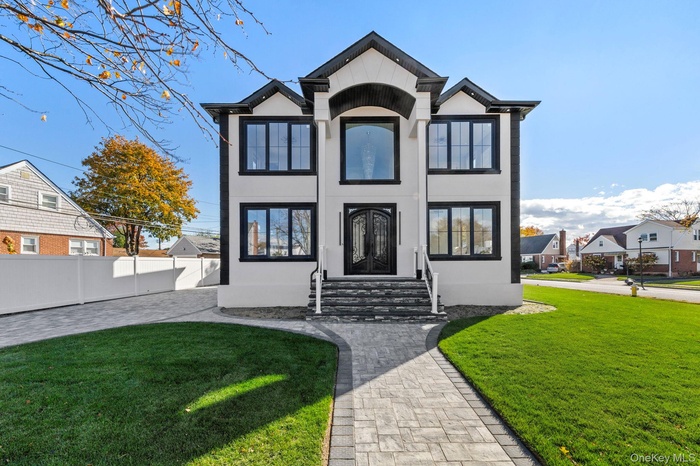 View of front of home with stucco siding
