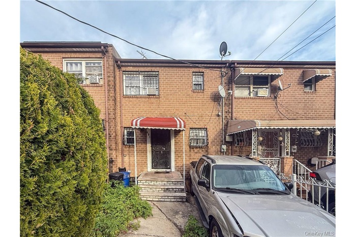 View of front of home with brick siding