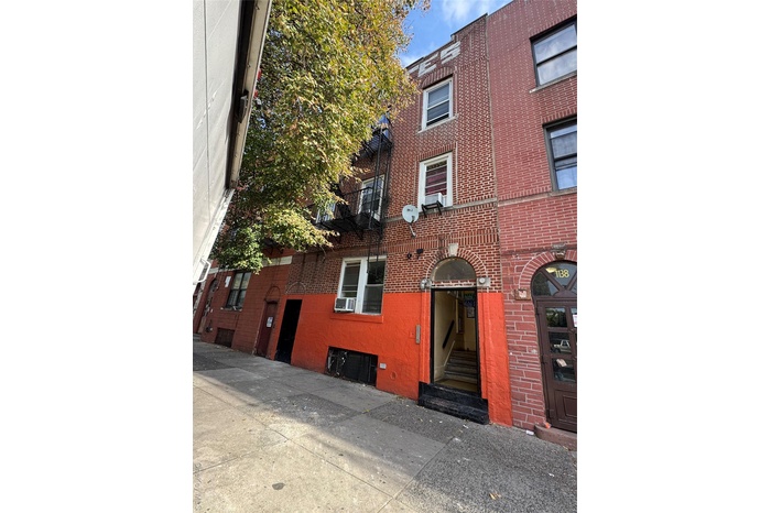 View of property featuring entry steps