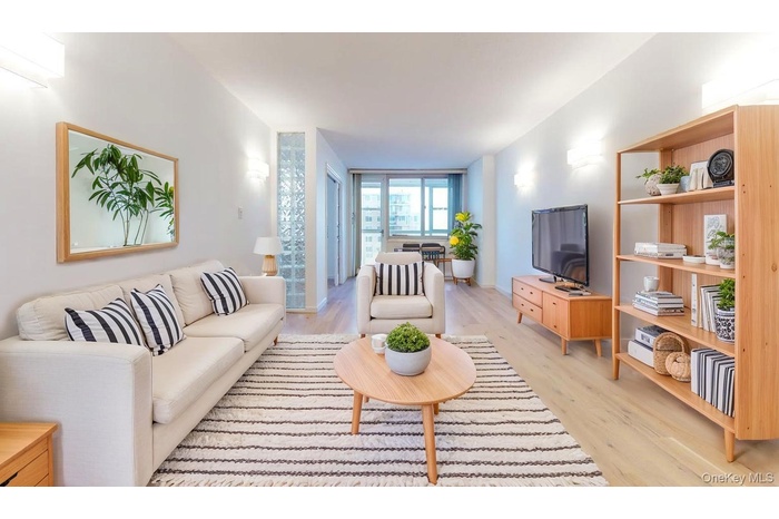 Living area featuring light wood-type flooring