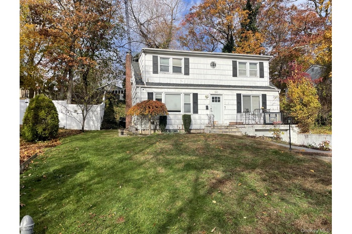 View of front facade with a chimney