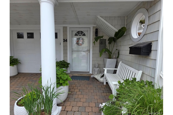 Property entrance with a porch