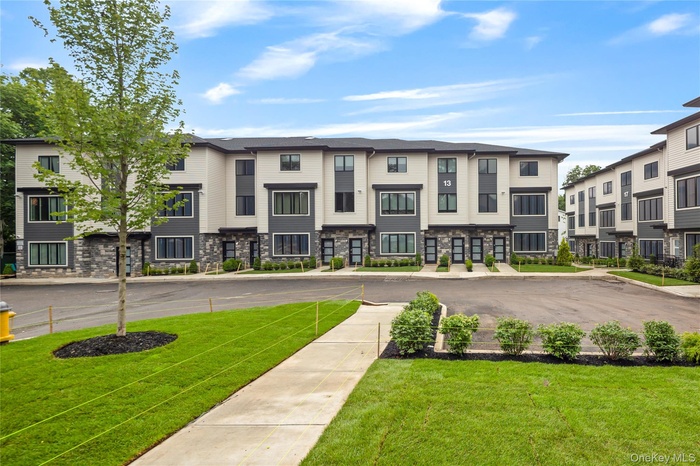 View of building exterior with a residential view