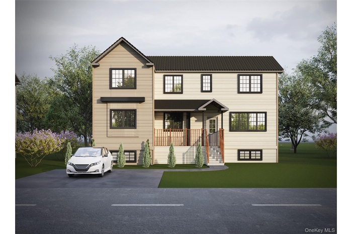 View of front of property featuring a tiled roof and covered porch