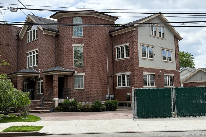 View of front of home with brick siding