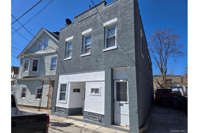 View of front of property with brick siding