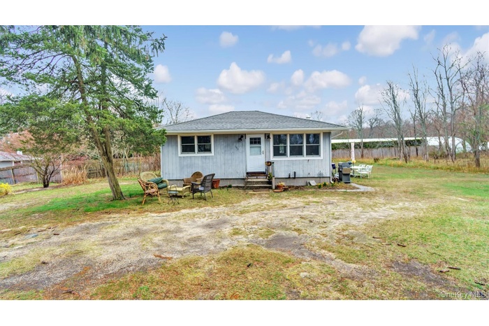 Back of house featuring entry steps