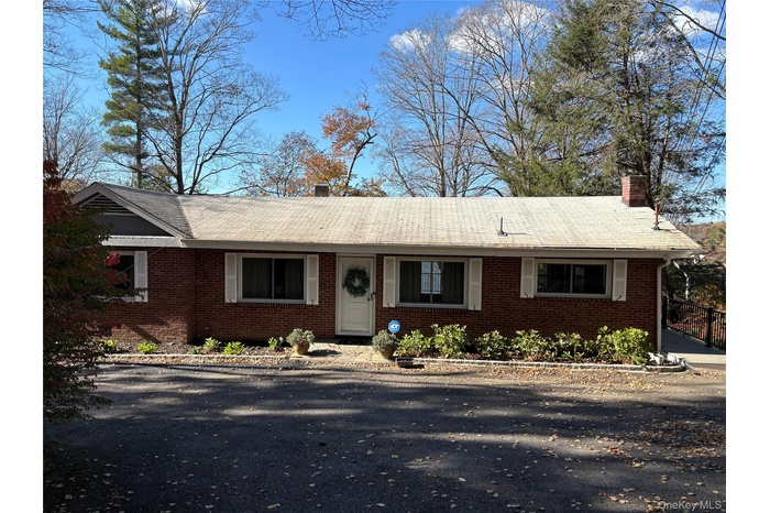 View of front of home with brick siding