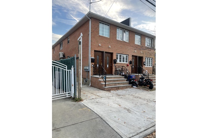 View of front of property with brick siding