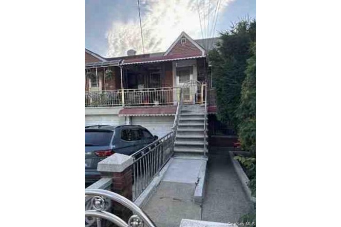 View of front of property featuring stairs