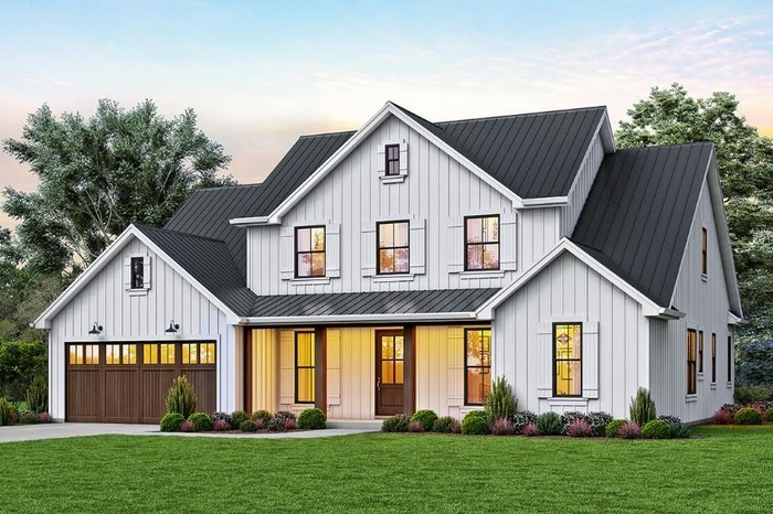 Modern farmhouse with a front yard, a standing seam roof, board and batten siding, and a porch