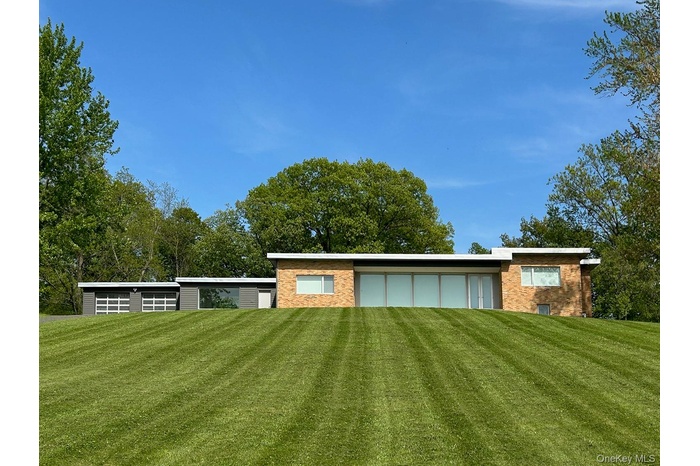 Mid-century modern home high on a hill
