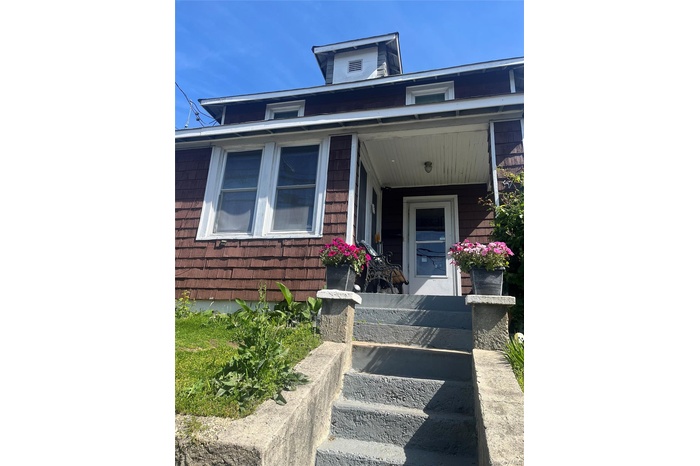 Property entrance with a porch