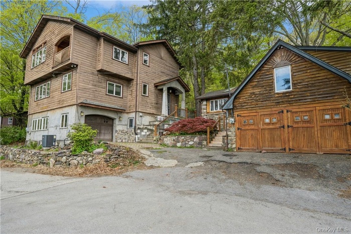 Main house on left & cottage on the right.