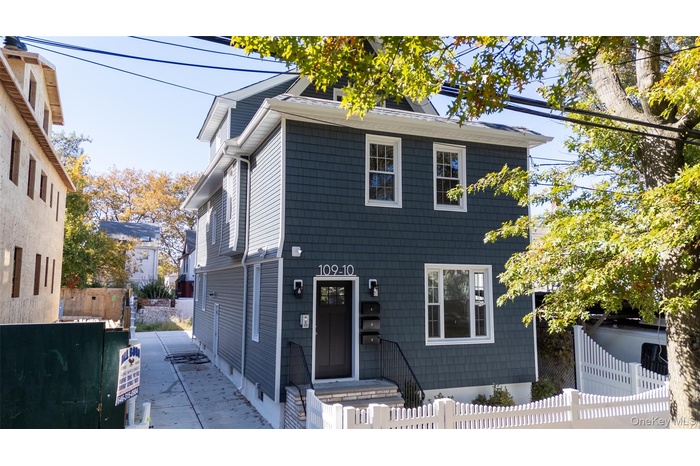 View of front facade with a fenced front yard