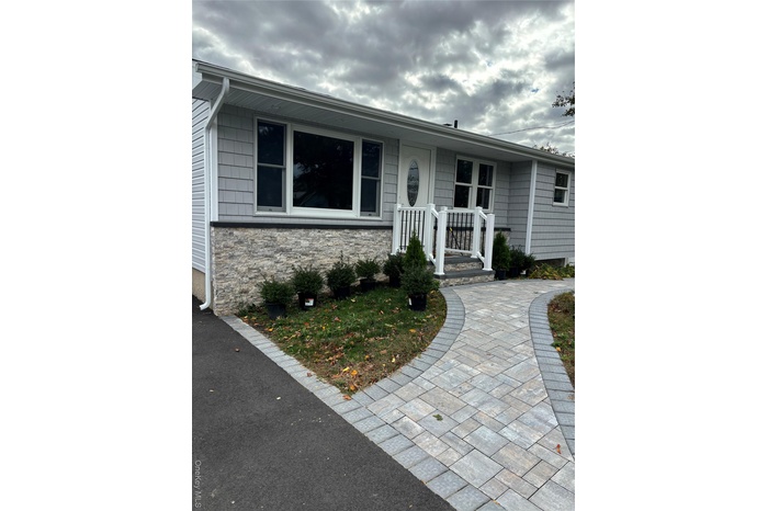 View of front of home with stone siding