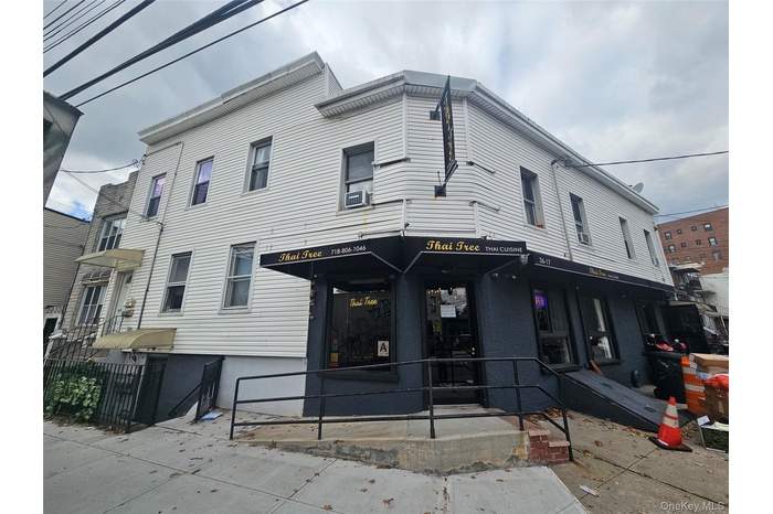 Corner of front of property, showing both 36-15 and 36-17 Greenpoint Ave.