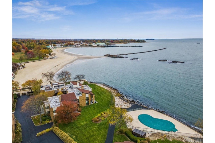 Aerial view of a Long Island Sound and a pool area
